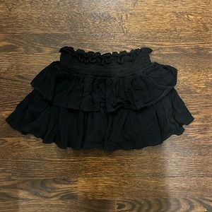 girls black ruffle skirt (girls medium but is short)